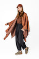 abbacino-poncho-de-mujer-en-tonos-naranjas-tejido-jaspeado-tacto-suave-y-c-lido- image 2